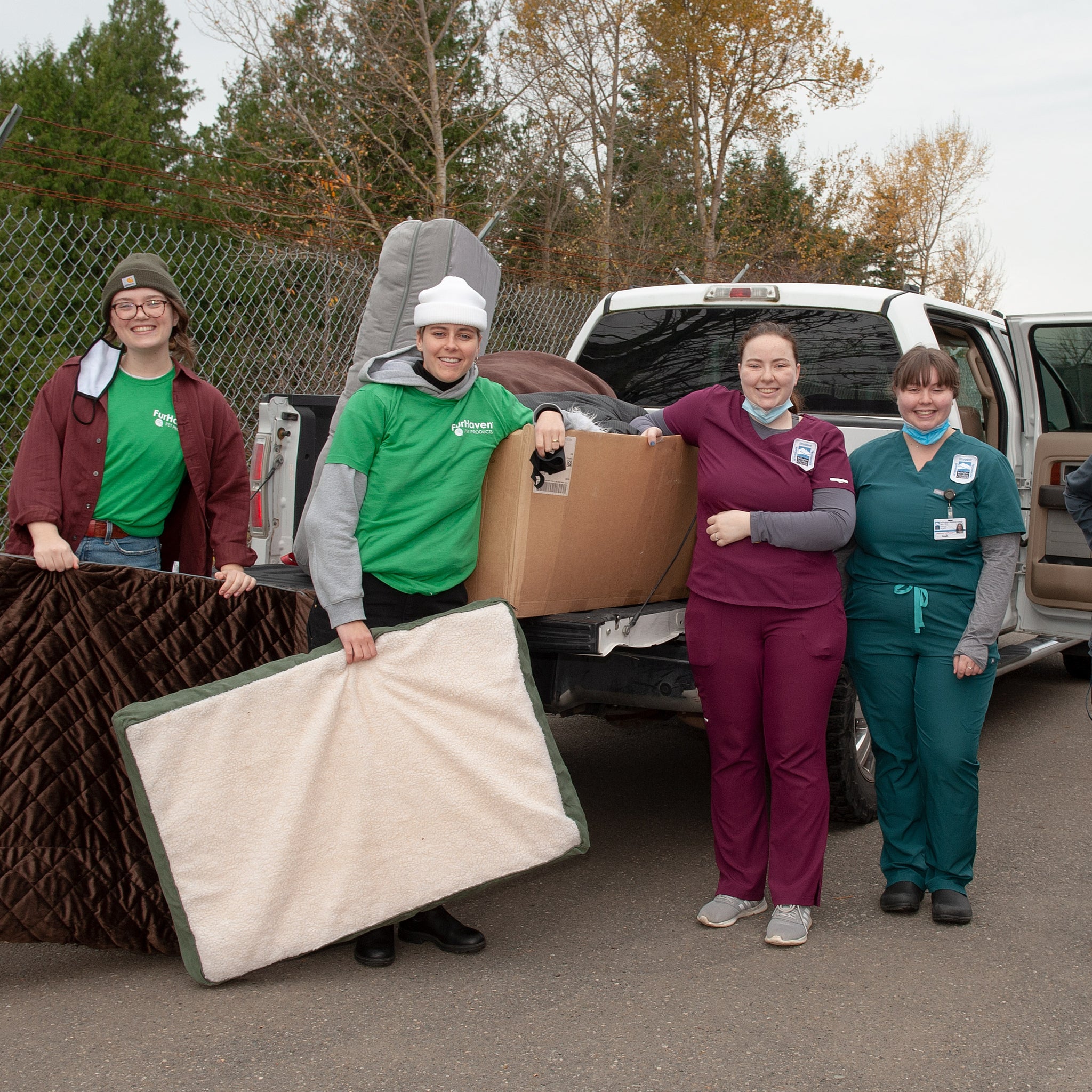 Members of the FurHaven team and Vet Tech Club working to deliver relief supplies to flood victims from FurHaven Pet Products