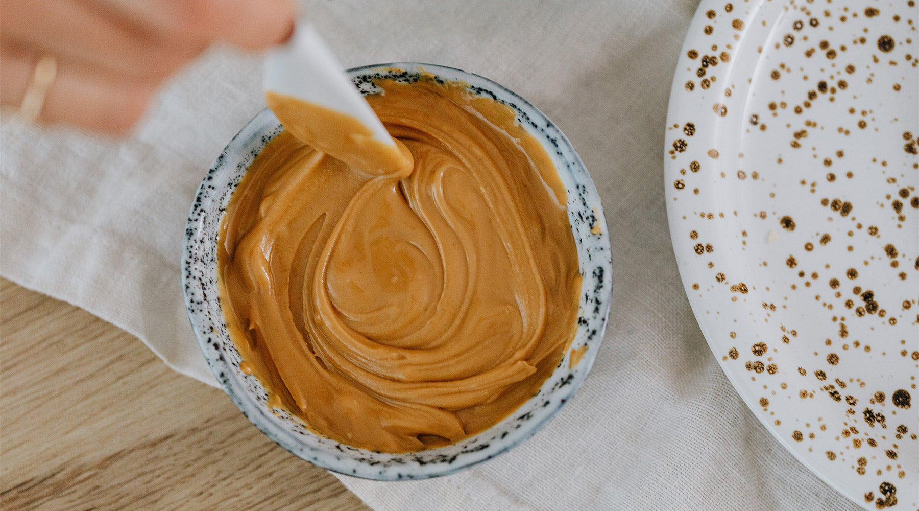 A bowl of peanut butter, at FurHaven Pet Products